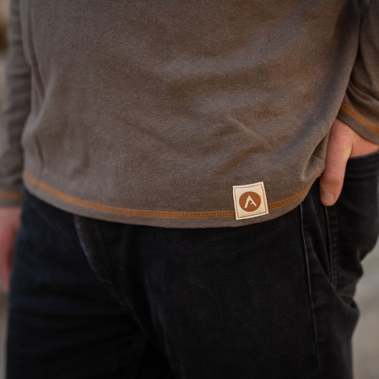 Cool and comfortable long sleeve tee for layering or to be worn on its own. The Hemp/Cotton blend provides natural breathability and anti-microbial properties to help reduce odor. This tee is finished with a burnt orange top stitch.