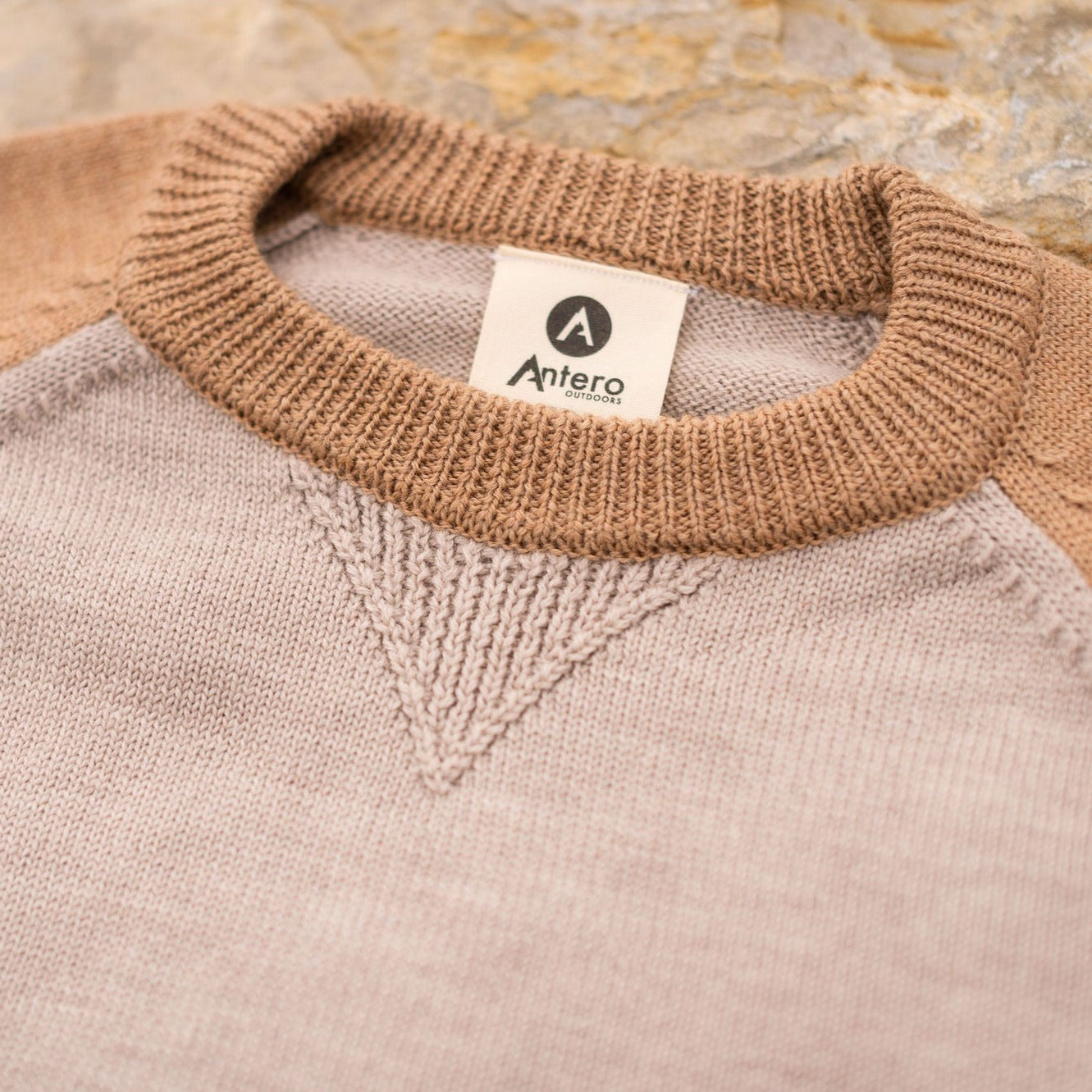 A comfortable classic in soft merino wool. Knitted in the United States with fine Italian merino wool yarn. The Colorado Sweater is sized unisex Details Made in the United States 100% merino wool Classic fit / high crew neck Contrast color raglan sleeve 2 colors: sand/tan, olive/taupe Unisex sizing