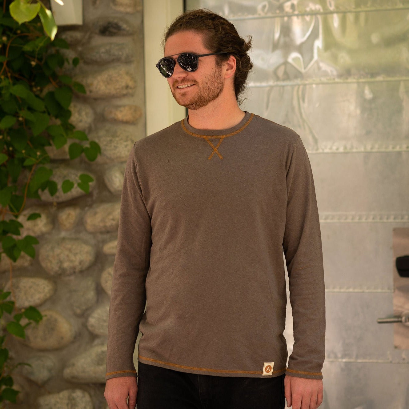 Cool and comfortable long sleeve tee for layering or to be worn on its own.  The Hemp/Cotton blend provides natural breathability and anti-microbial properties to help reduce odor.  This tee is finished with a burnt orange top stitch.