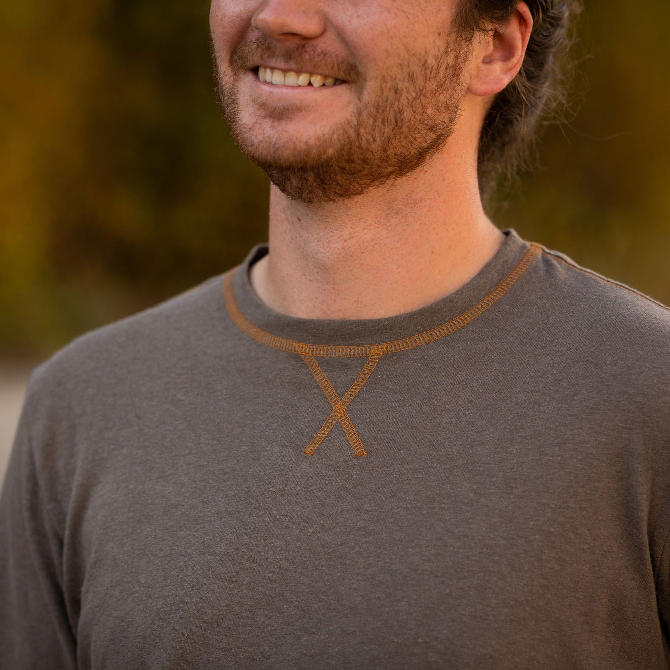 Cool and comfortable long sleeve tee for layering or to be worn on its own.  The Hemp/Cotton blend provides natural breathability and anti-microbial properties to help reduce odor.  This tee is finished with a burnt orange top stitch.